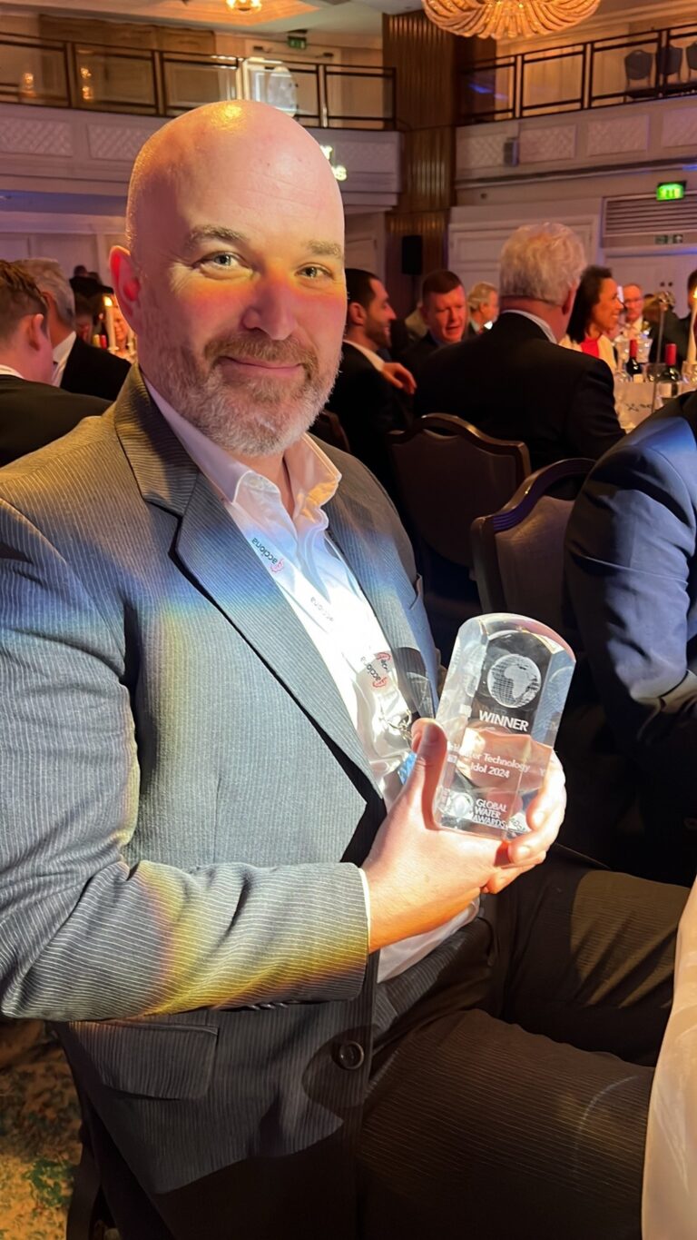 David McGarry of Gradiant’s H+E. with the “Water Technology Idol” winner award for the AquaCritox SCWO PFAS destruction technology.